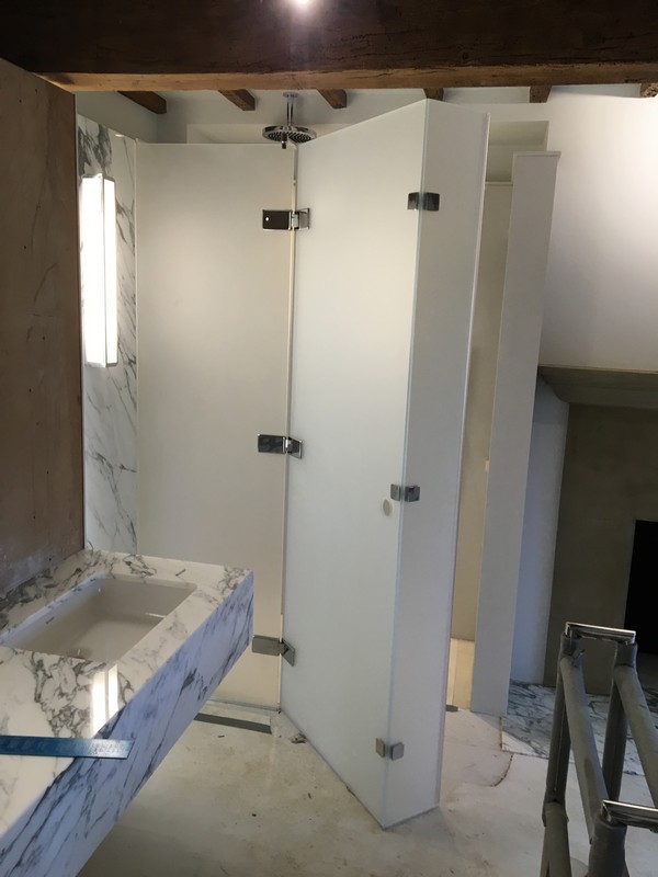Bespoke frosted glass shower enclosure in Olympic Park luxury bathroom