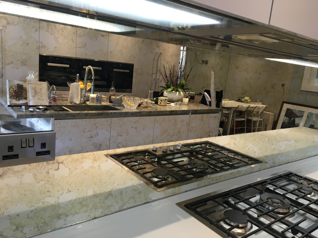 Mirror glass splashback in Olympic Park luxury kitchen